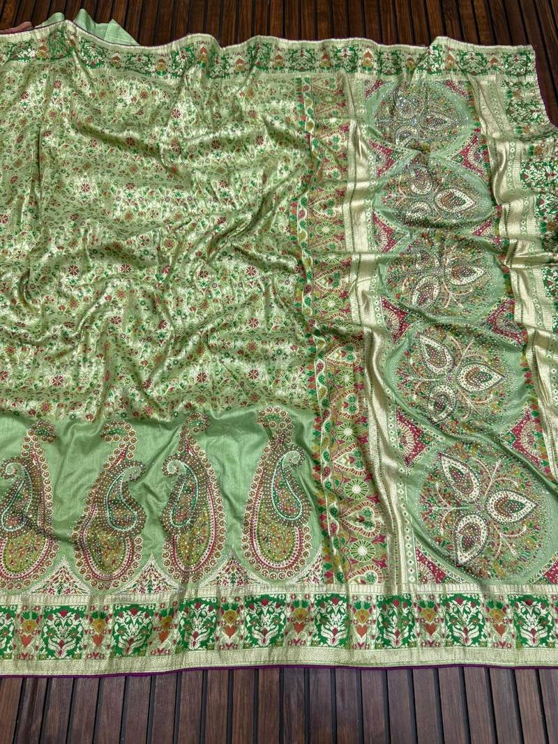 parrot green siroski diamonds twins figure with rich pallu pasmina silk saree