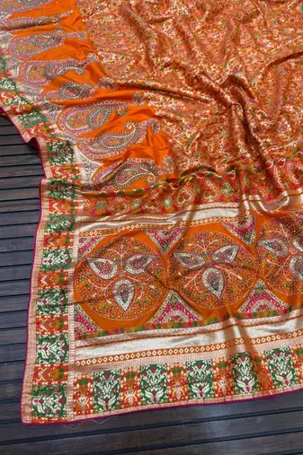 orange siroski diamonds twins figure with rich pallu pasmina silk saree