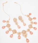 festive rose gold pink floral bib necklace set with stone drops and flower cluster earrings