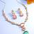 reception wear rose gold pink and green pendant necklace set with cushion stone drop and geometric earrings