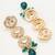 bridal gold-plated kundan crescent motif long necklace set with emerald crystals and pearl drops