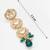 bridal gold-plated kundan crescent motif long necklace set with emerald crystals and pearl drops