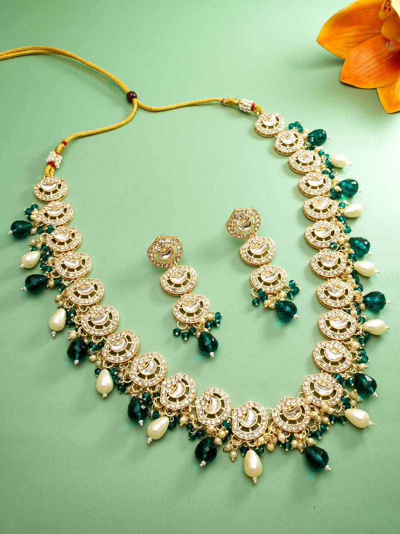 bridal gold-plated kundan crescent motif long necklace set with emerald crystals and pearl drops