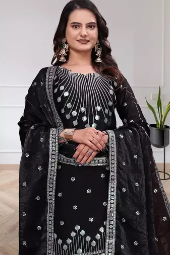 Womens trendy black silk blend embroidered kurta and sharara suit set with dupatta
