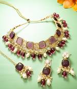 gold plated kundan choker necklace set with purple stone, pearl drop earrings and maang tikka