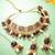gold plated kundan choker necklace set with purple stone, pearl drop earrings and maang tikka