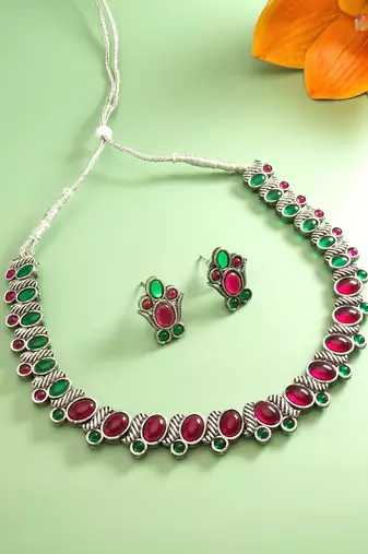 oxidized silver choker necklace set with pink and green stone and stud earrings