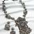 oxidized silver floral rectangular panel necklace set with large pendant and ghungroo earrings
