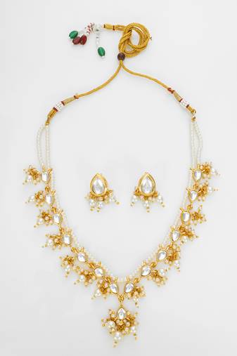 gold plated white kundan bridal set