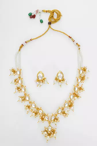 gold plated white kundan bridal set