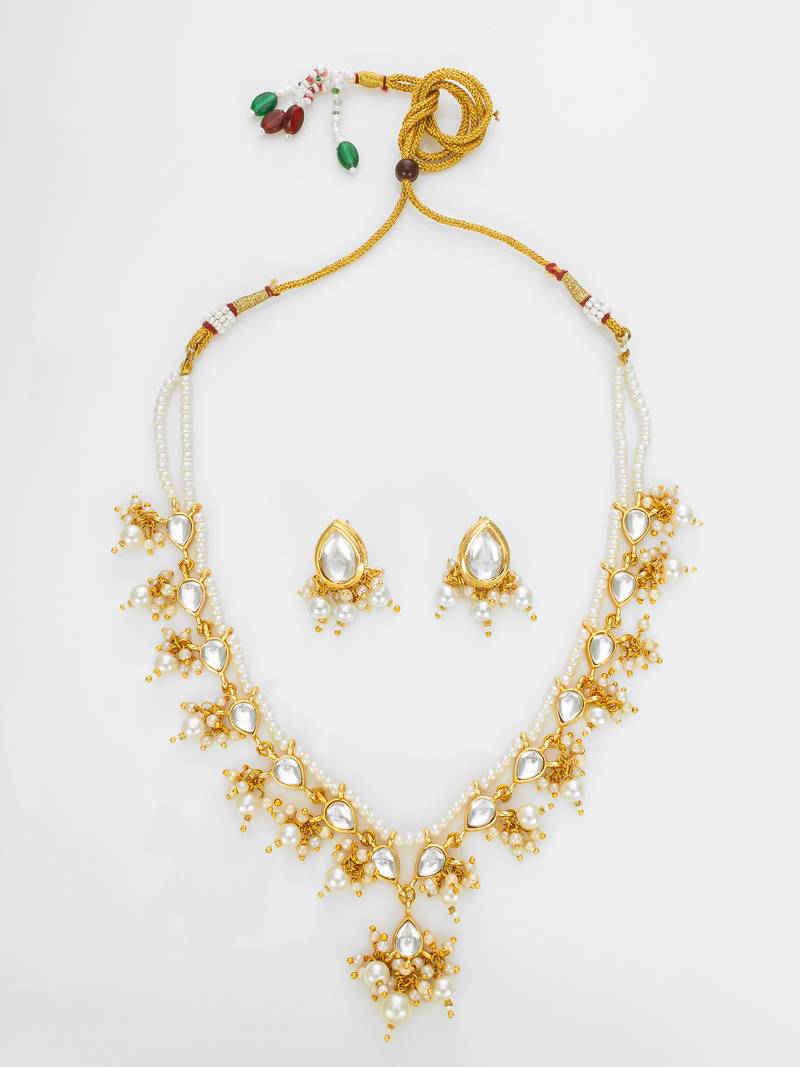 gold plated white kundan bridal set