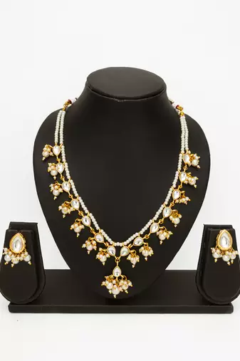 gold plated white kundan bridal set