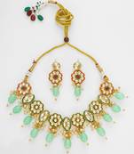 gold plated mint green kundan set