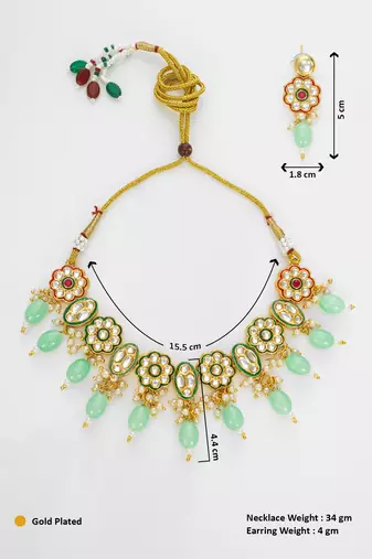 gold plated mint green kundan set