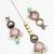oxidized silver elephant motif choker necklace set with catseye stones, earrings and maang tikka