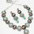 oxidized silver catseye necklace set with panther motif panels and pearl drop earrings