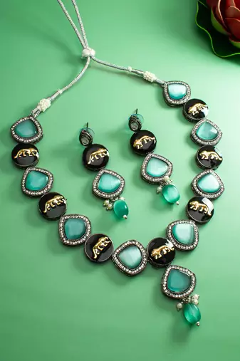 oxidized silver catseye necklace set with panther motif panels and pearl drop earrings