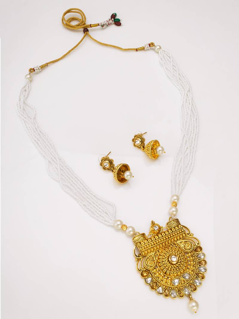 antique gold kundan pendant long necklace with seed pearls and jhumka earrings