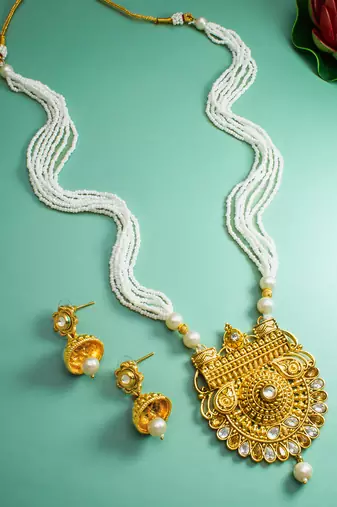 antique gold kundan pendant long necklace with seed pearls and jhumka earrings