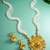 antique gold kundan pendant long necklace with seed pearls and jhumka earrings