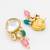 kundan choker necklace set with pink and teal bead strands, meenakari stud earrings