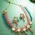 kundan choker necklace set with pink and teal bead strands, meenakari stud earrings