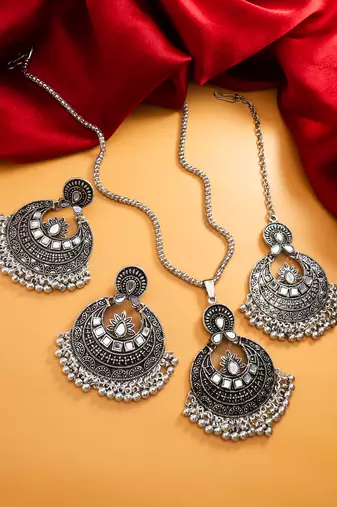 oxidized silver lotus mirror chandbali pendant necklace set with earrings and maang tikka