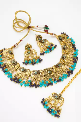 antique gold elephant motif choker necklace set with beads, earrings and maang tikka