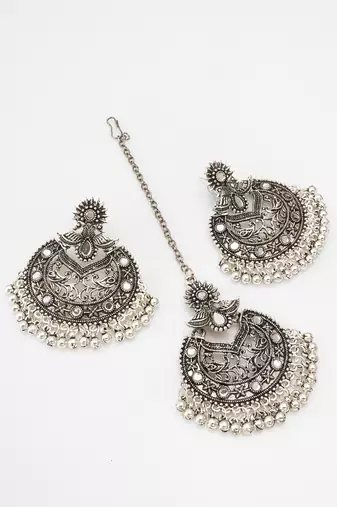 oxidized silver floral chandbali pendant necklace set with mirror work earrings and maang tikka
