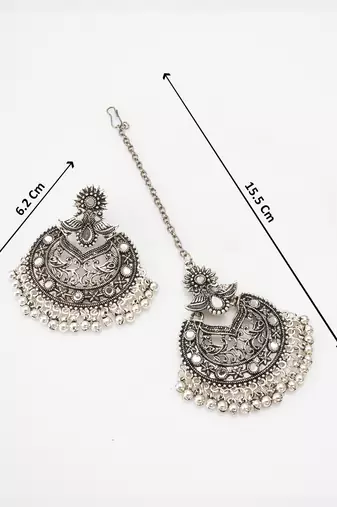 oxidized silver floral chandbali pendant necklace set with mirror work earrings and maang tikka