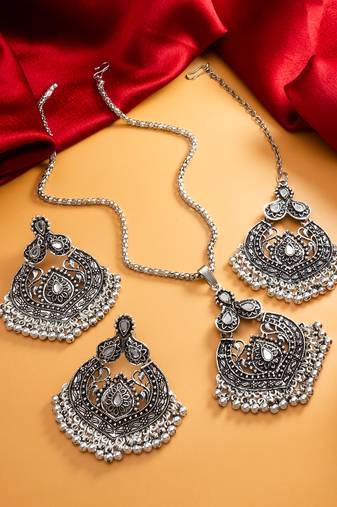 oxidized silver chandbali pendant necklace set with long chain and earrings