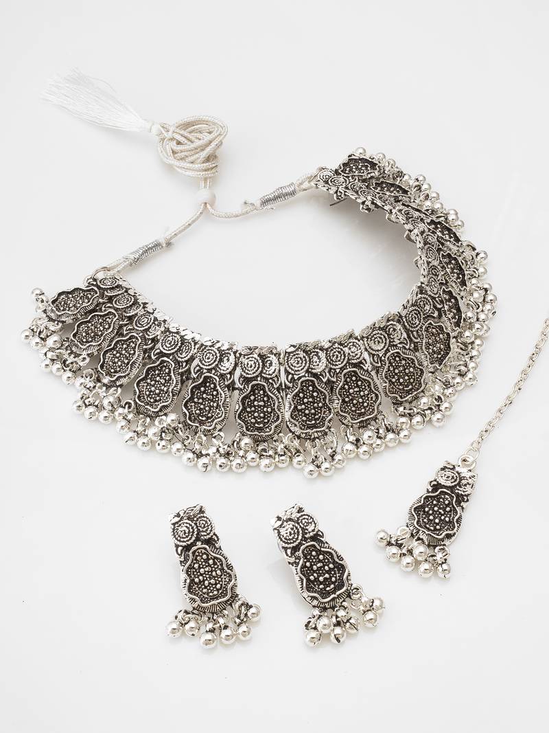 oxidized silver floral shield choker necklace set with ghungroo earrings and maang tikka