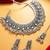 oxidized silver mirror work floral choker necklace set with ghungroo earrings and maang tikka