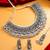 oxidized silver peacock motif choker necklace set with ghungroo earrings and maang tikka