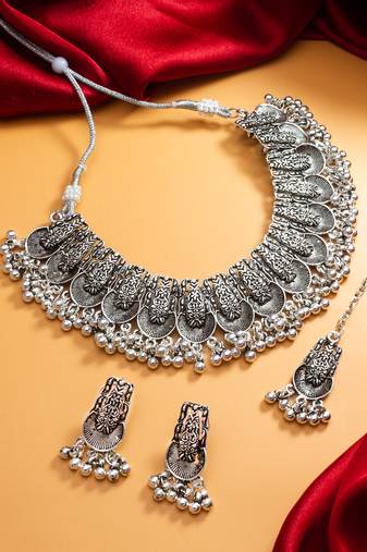oxidized silver fan motif collar choker necklace set with ghungroo earrings and maang tikka