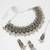 oxidized silver leaf motif choker necklace set with ghungroo drops, earrings and maang tikka