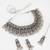 oxidized silver floral motif broad choker necklace set with ghungroo fringe, earrings and maang tikka for navratri