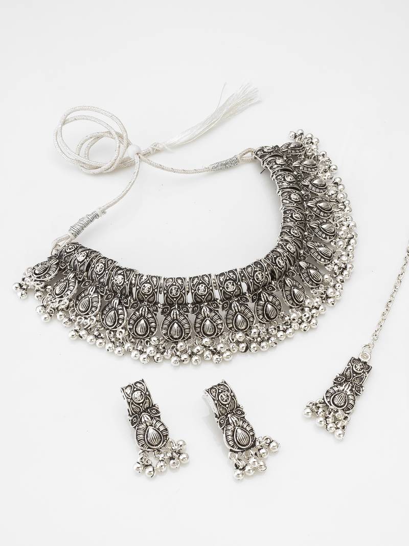 oxidized silver floral motif broad choker necklace set with ghungroo fringe, earrings and maang tikka for navratri