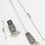 oxidized silver floral panel choker necklace set with ghungroo drops, earrings and maang tikka