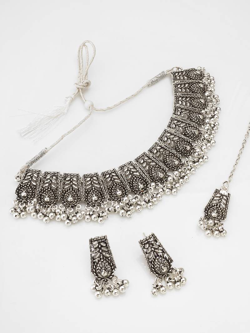 oxidized silver leaf and teardrop panel choker necklace set with ghungroo drops, earrings and maang tikka