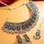 oxidized silver leaf and teardrop panel choker necklace set with ghungroo drops, earrings and maang tikka
