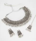 navratri special oxidized silver motif choker necklace set with ghungroo fringe, earrings and maang tikka