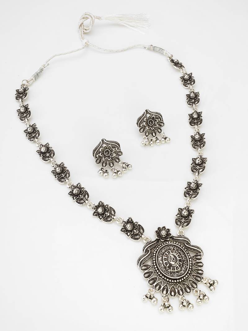 oxidized silver floral leaf chain necklace set with stone accents, circular pendant and ghungroo earrings