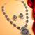 oxidized silver layered floral necklace set with ghungroo pendant and stud earrings