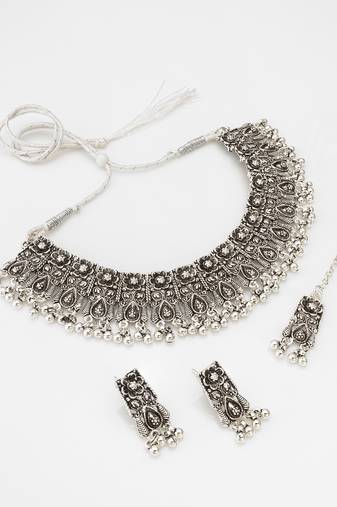 navratri special oxidized silver broad choker necklace set with ghungroo fringe, earrings and maang tikka