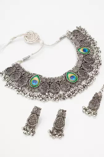 oxidized silver floral choker necklace set with ghungroo drops, earrings and maang tikka