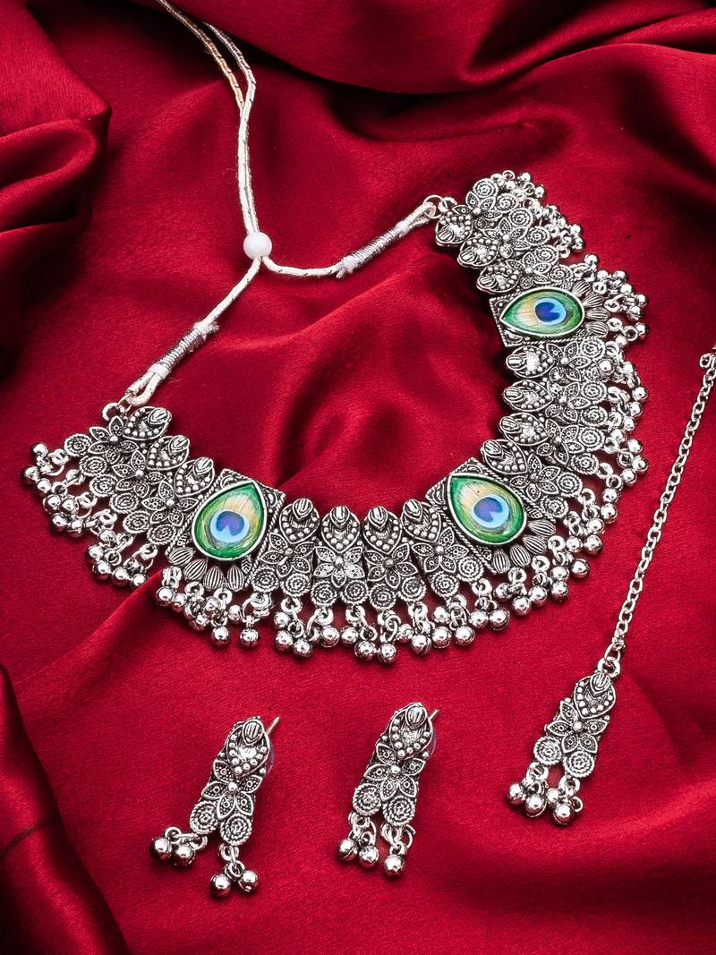 oxidized silver choker necklace set with peacock feather, ghungroo drops, earrings and maang tikka