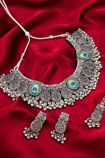 oxidized silver floral choker necklace set with ghungroo drops, earrings and maang tikka