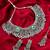 oxidized silver floral choker necklace set with ghungroo drops, earrings and maang tikka