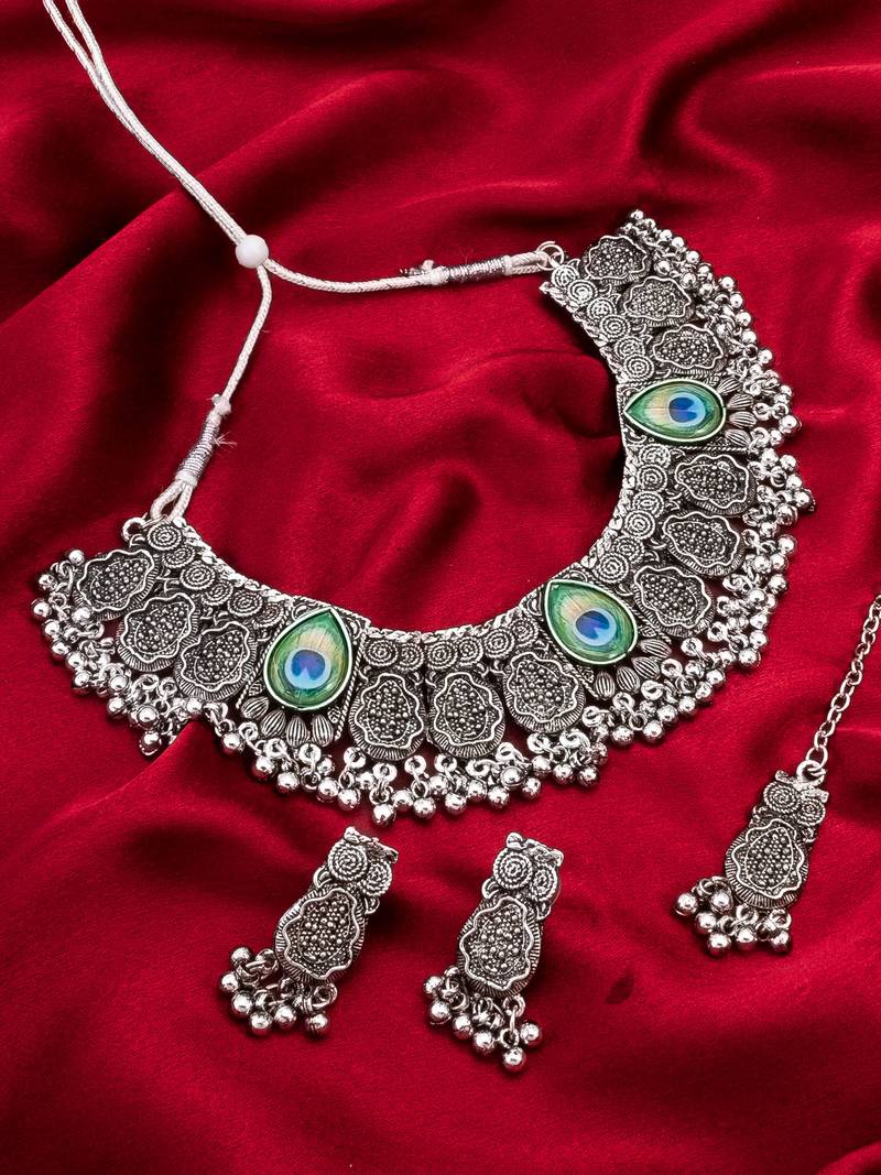 oxidized silver floral choker necklace set with ghungroo drops, earrings and maang tikka